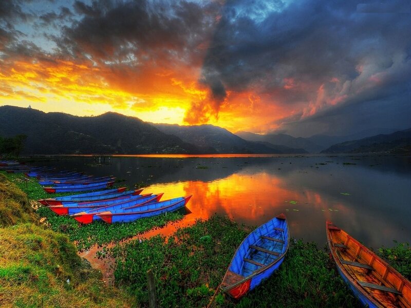 Blue Boats on Lake Shore — Orange, Dramatic, Sunset