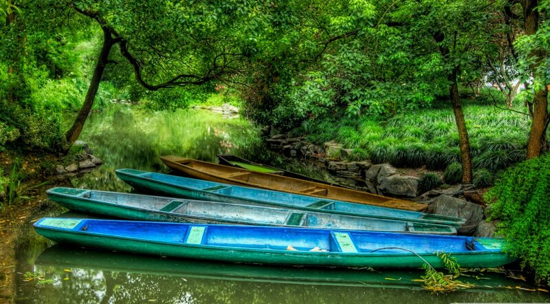 Blue Boats on River — Green, Serene