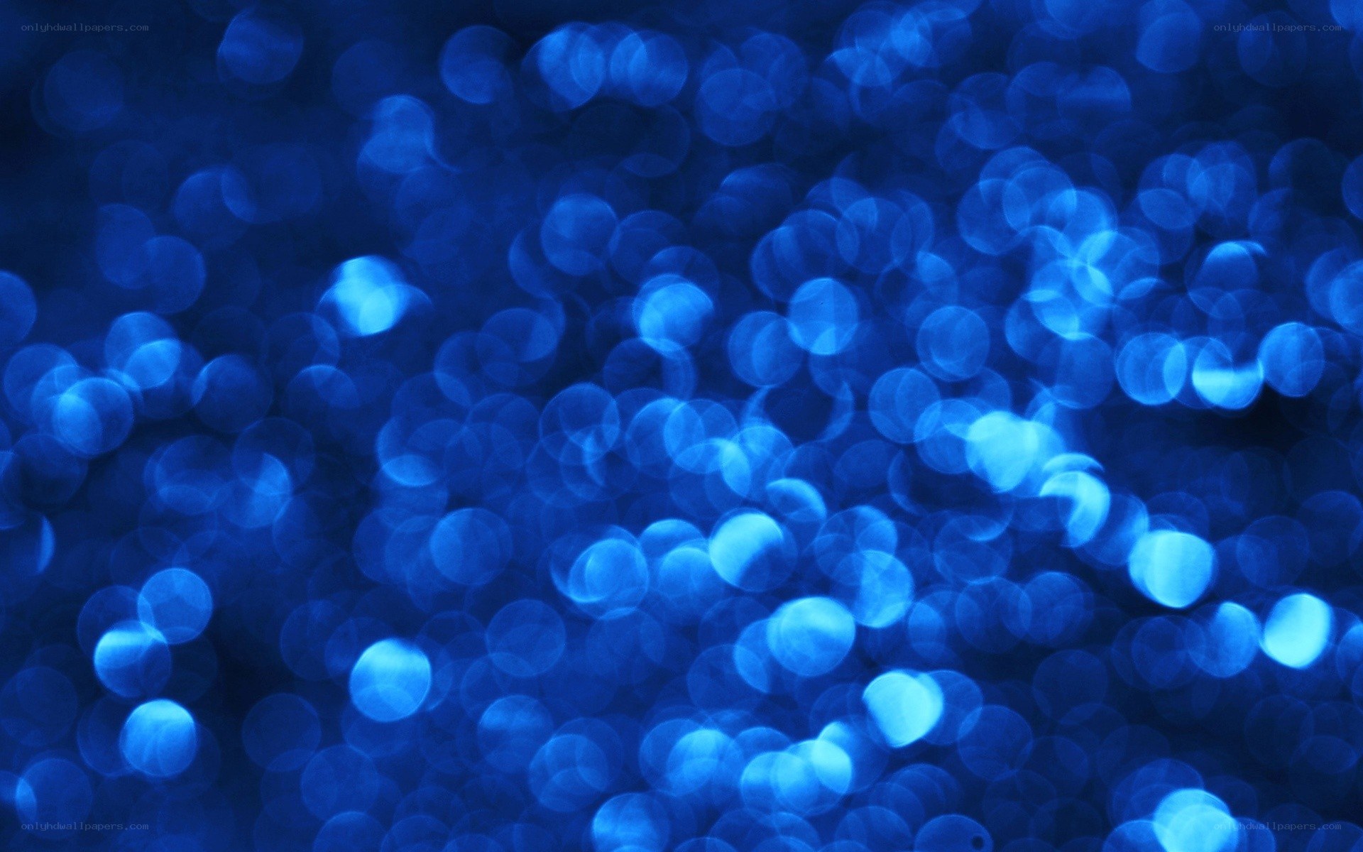 blue bokeh light circles
