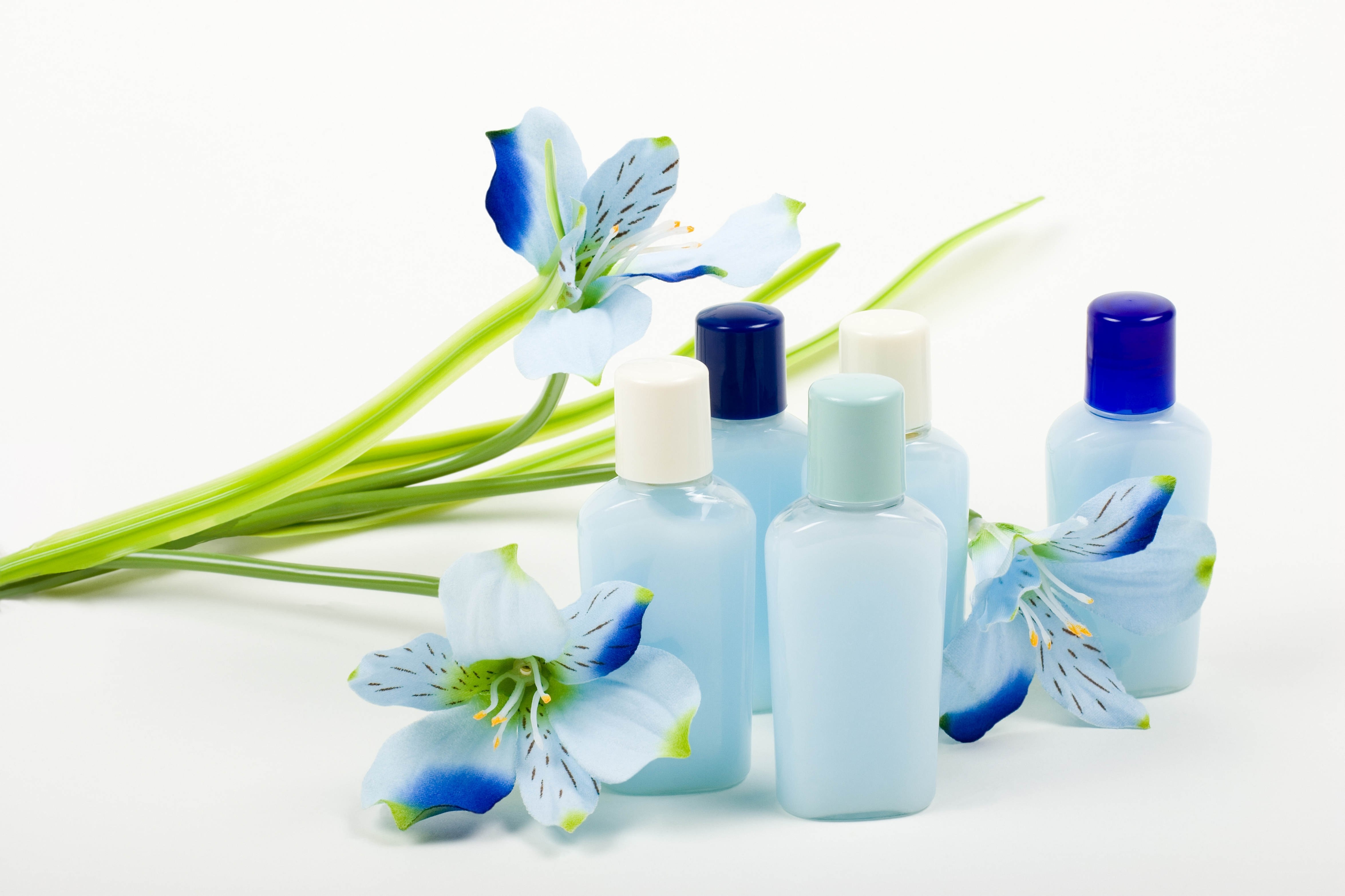Blue bottles with flowers