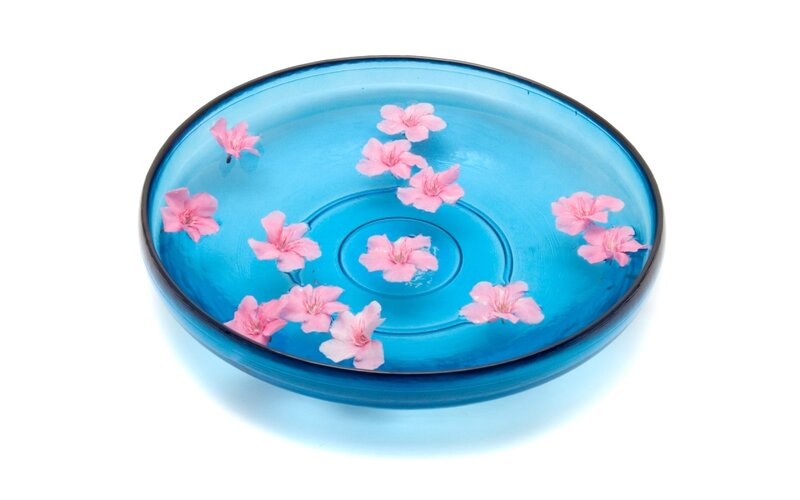 Blue bowl with floating flowers