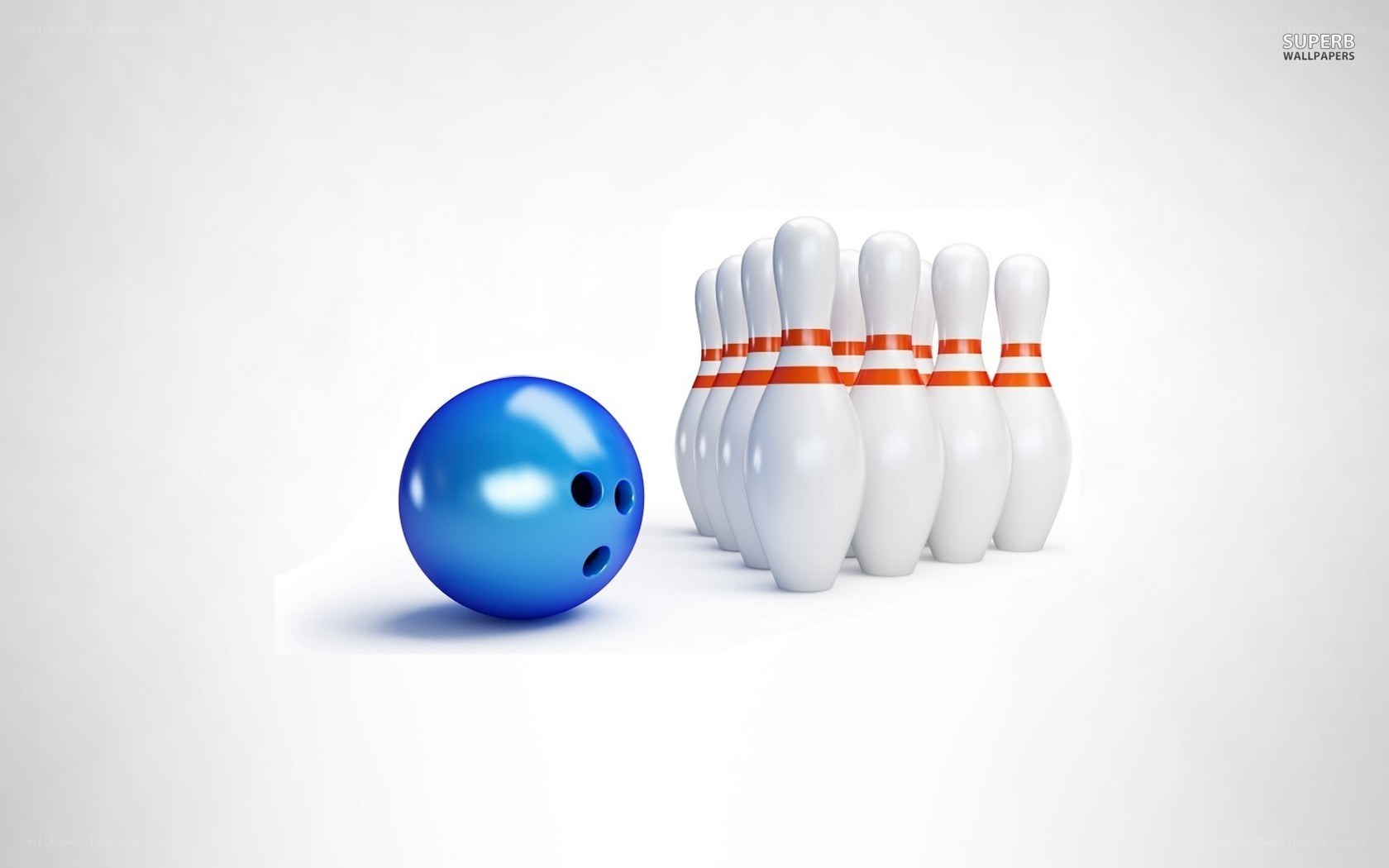 Blue bowling ball and pins