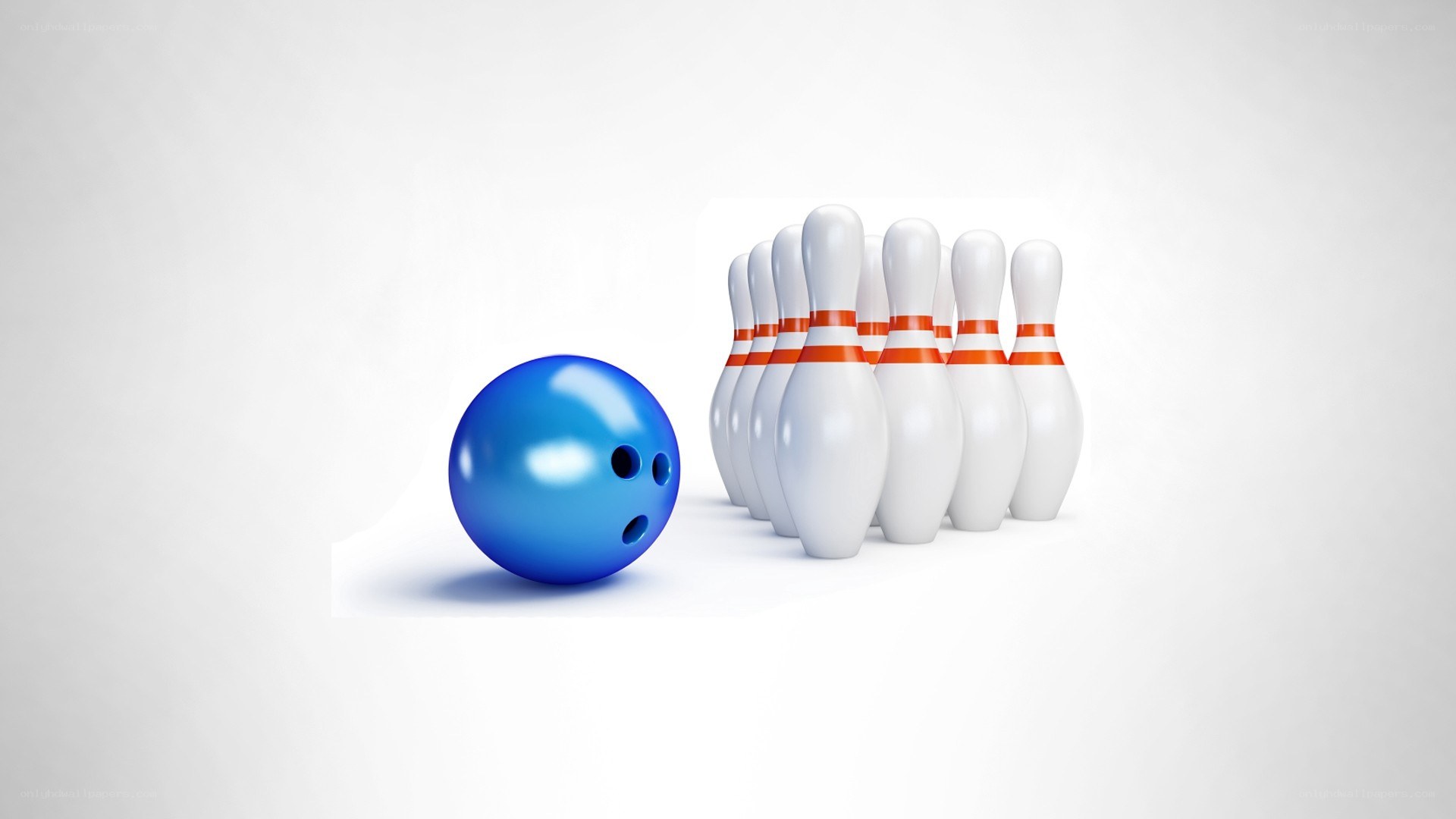 Blue bowling ball and pins