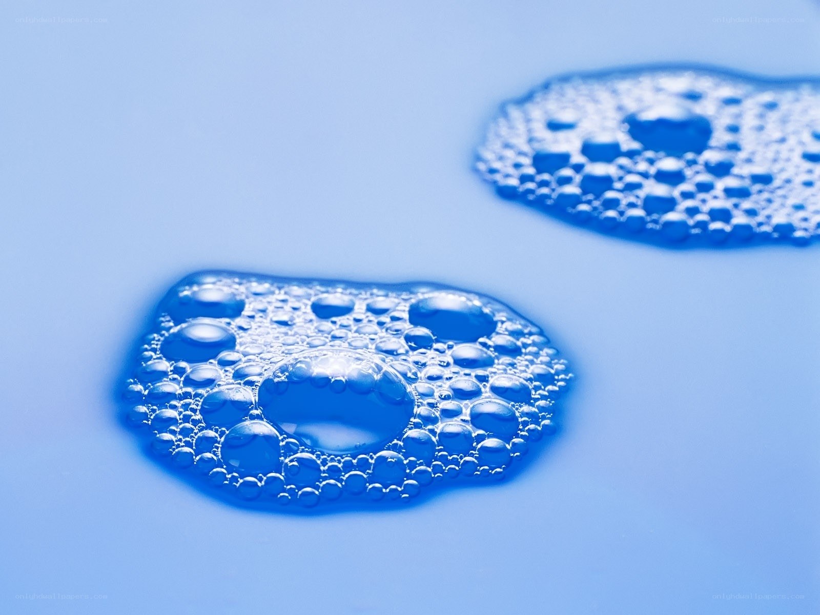 Blue bubbles on surface