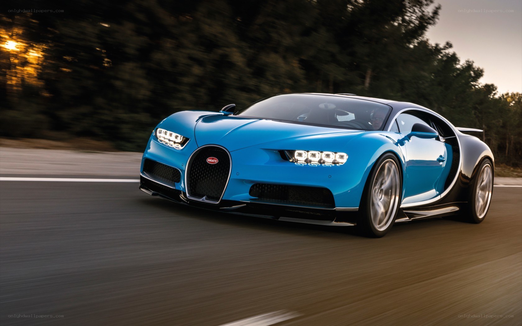 Blue Bugatti Chiron in motion