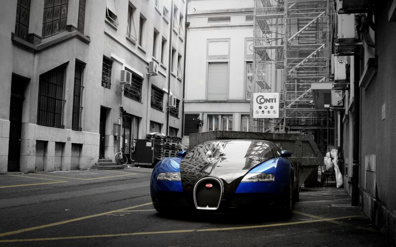 Blue Bugatti in urban alley