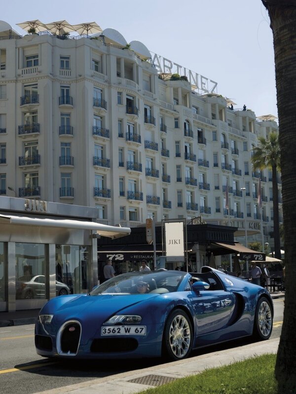 Blue Bugatti on a city street