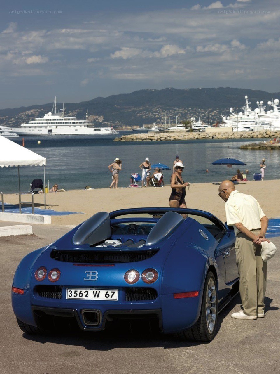 Blue Bugatti on beach