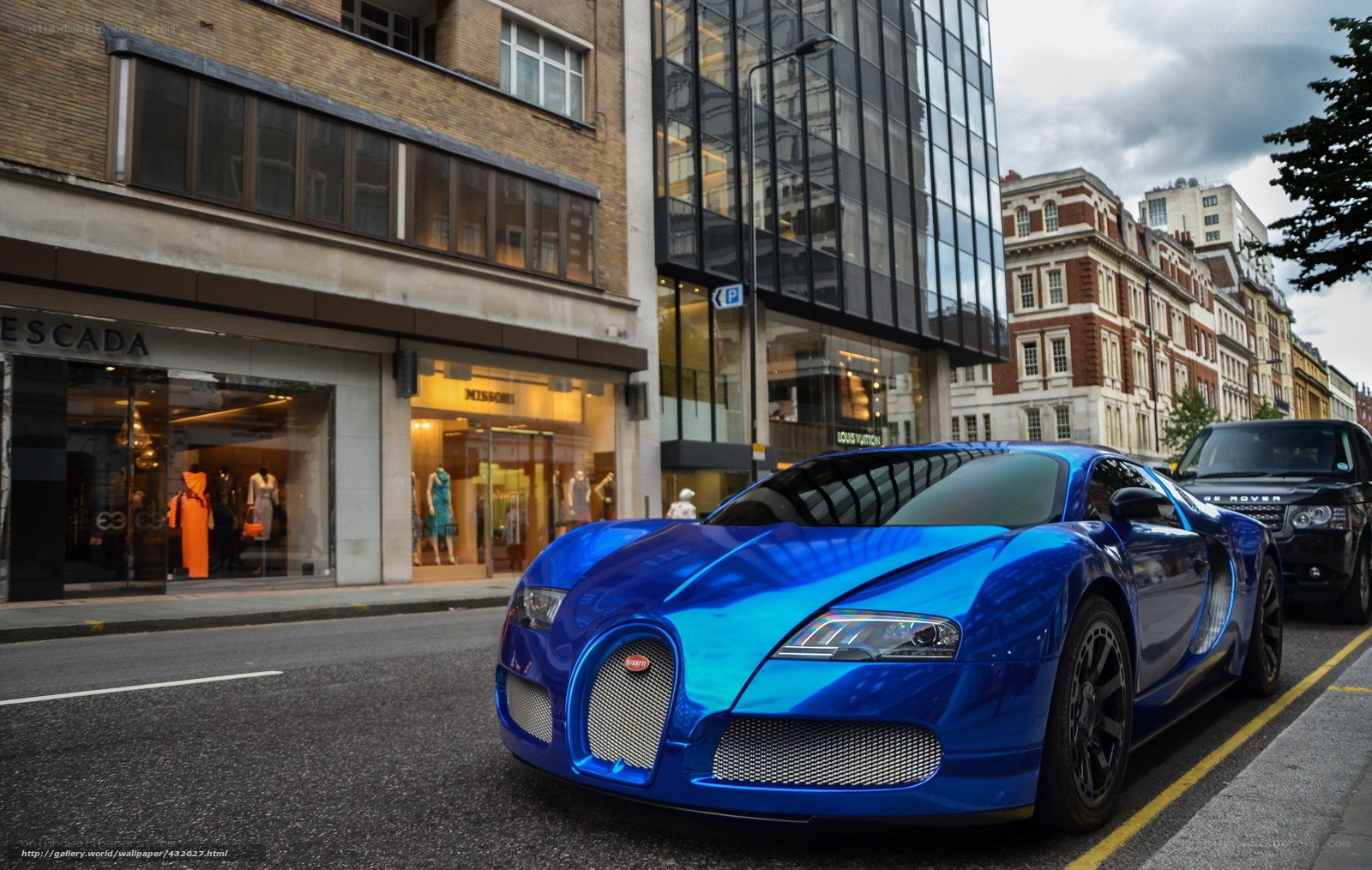 Blue Bugatti on city street