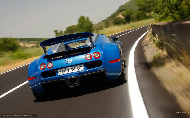 blue bugatti speeding on road