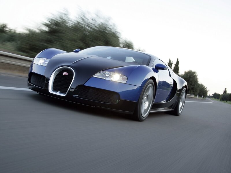 Blue Bugatti Veyron in motion