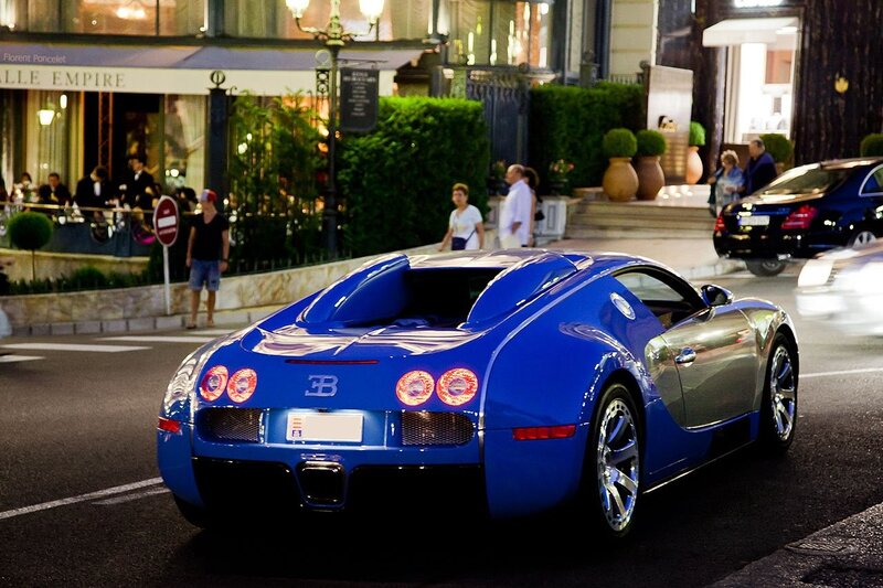 Blue Bugatti Veyron on city street