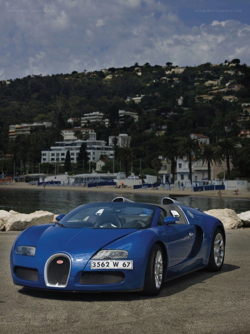 Blue Bugatti Veyron on the coast