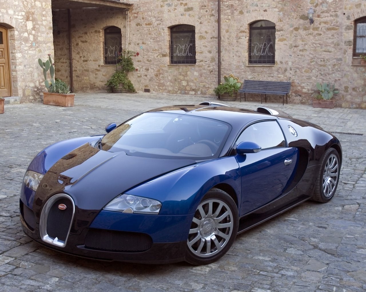 Blue Bugatti Veyron parked