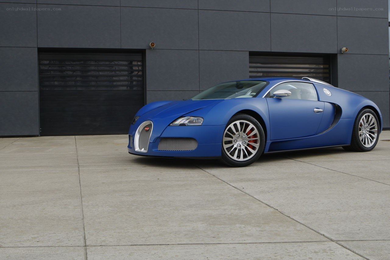 Blue Bugatti Veyron parked outside