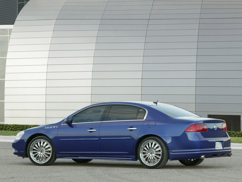 blue buick sedan parked