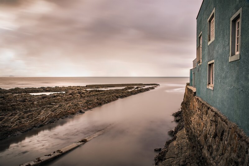 Blue Building by the Sea