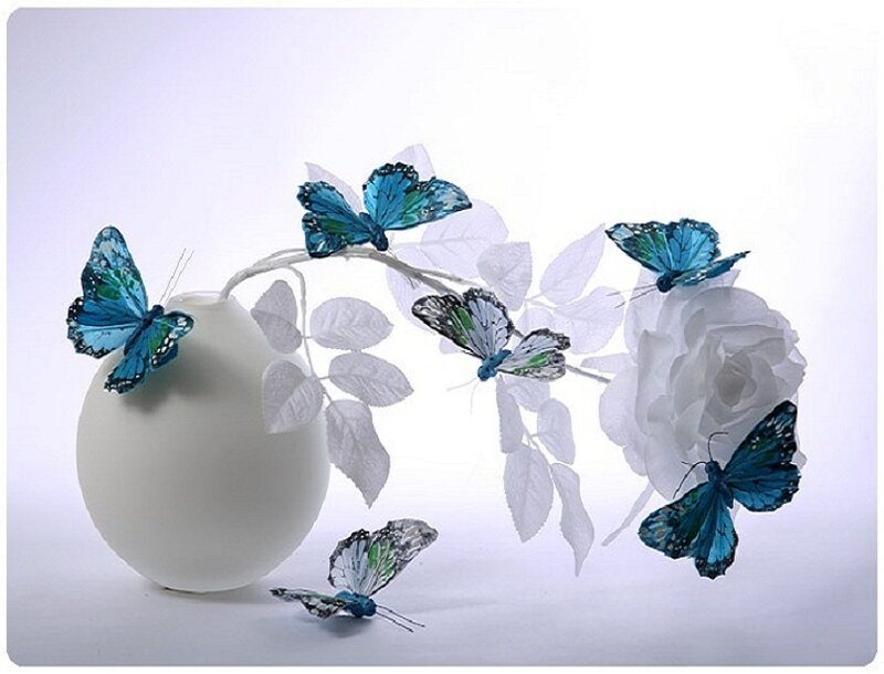 Blue Butterflies on White Vase