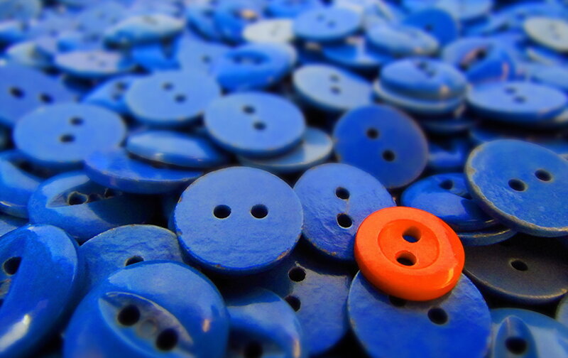 Blue Buttons with One Orange