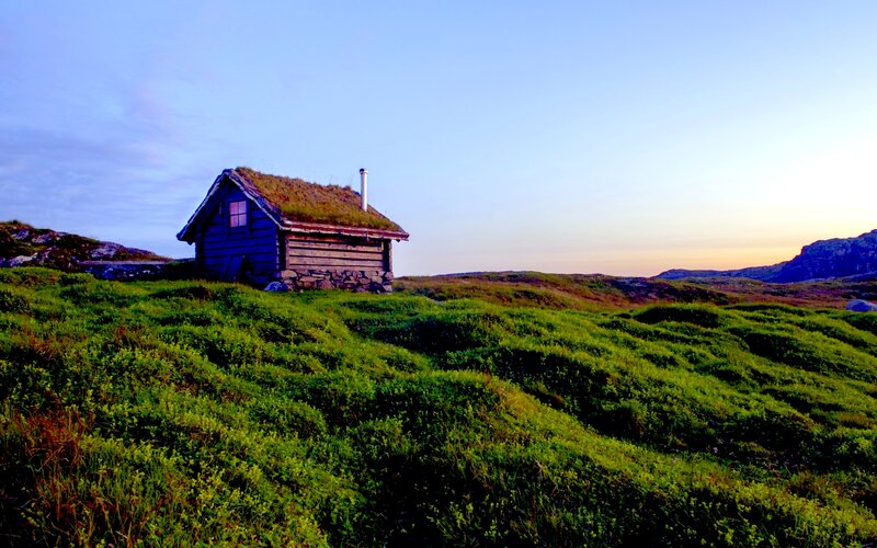 Blue Cabin on Hill