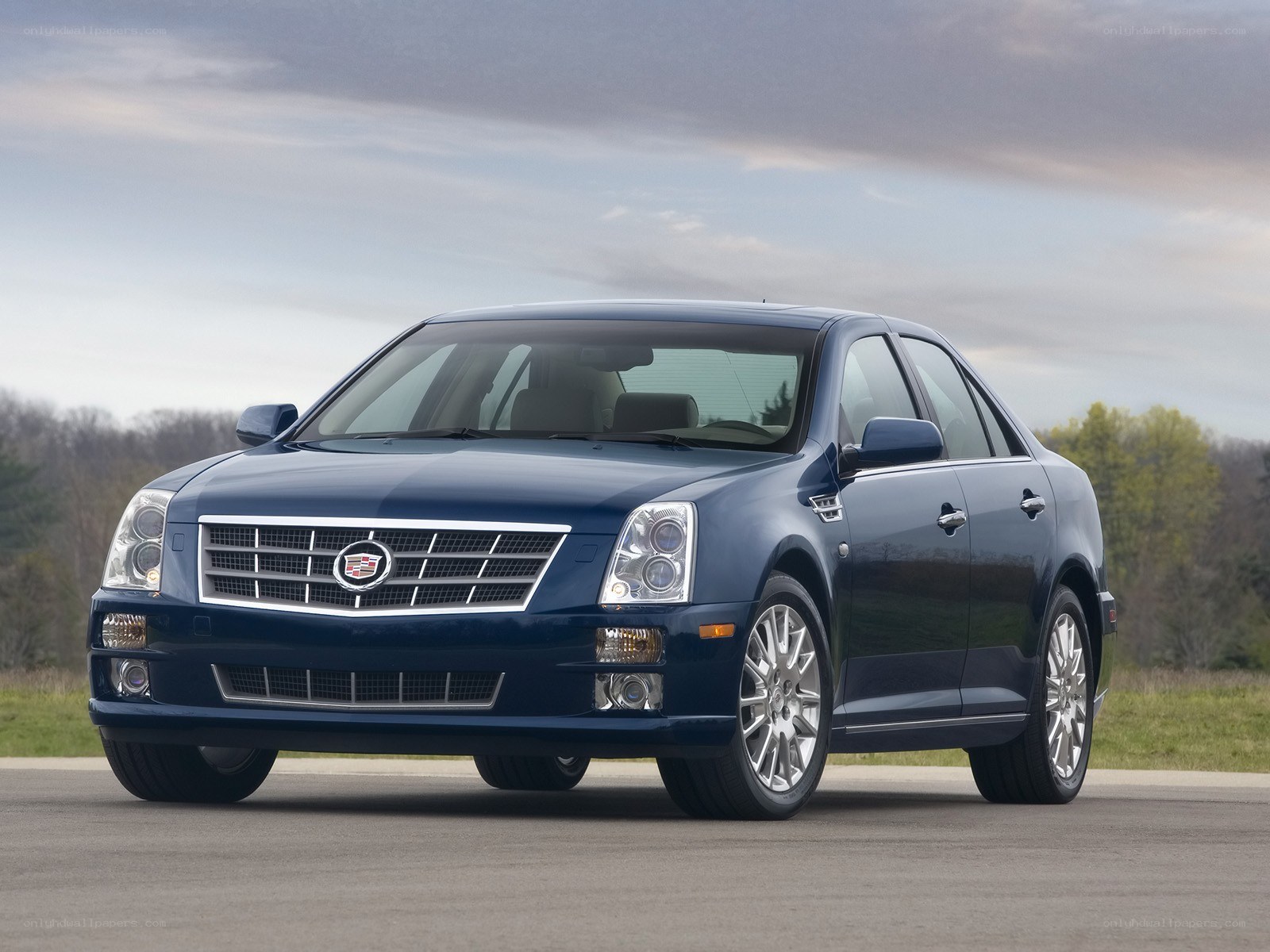blue cadillac sedan