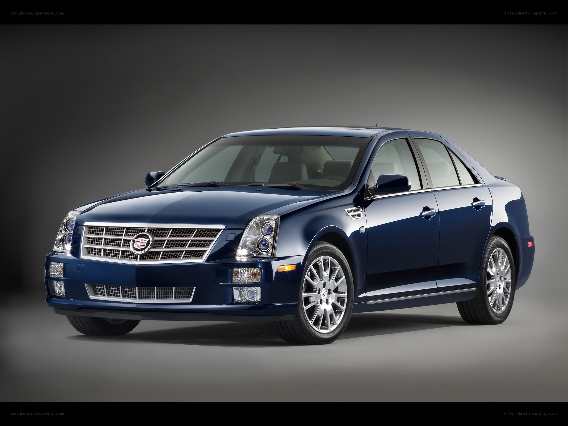 blue cadillac sedan