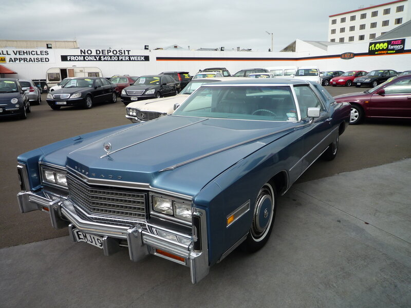 Blue Cadillac Sedan — Overcast