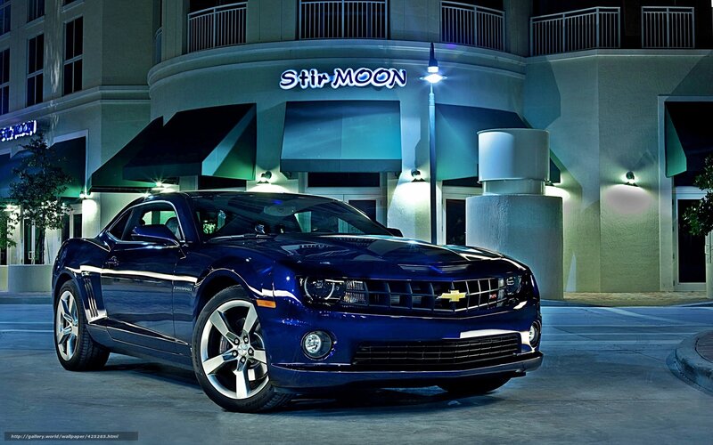 Blue Camaro at night