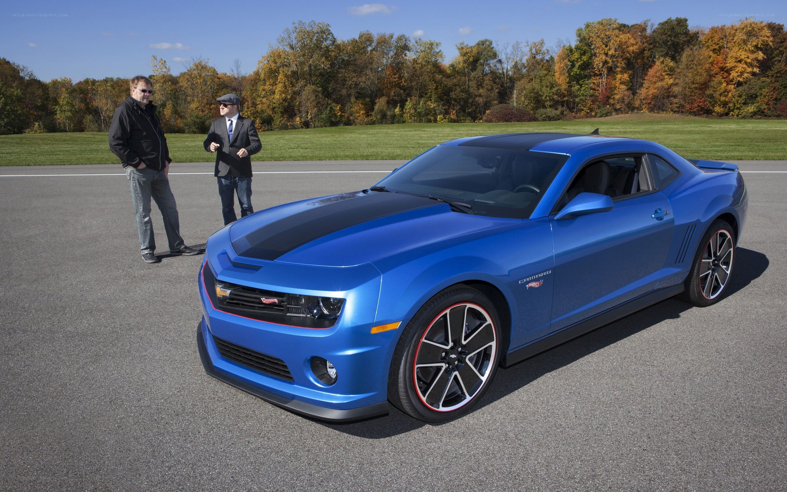 Blue Camaro on a track