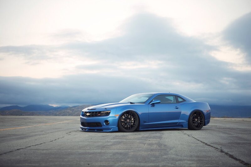 Blue Camaro on an airstrip