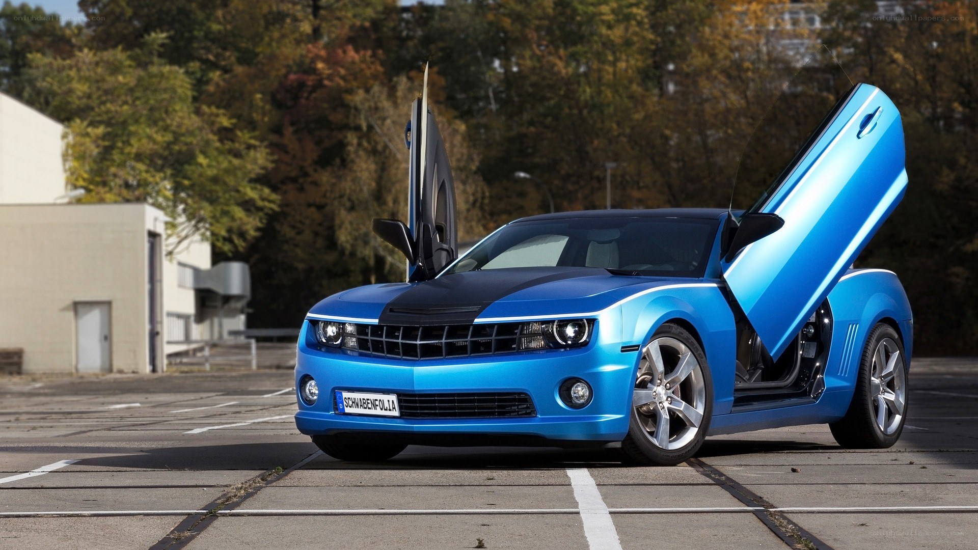 Blue Camaro with gullwing doors