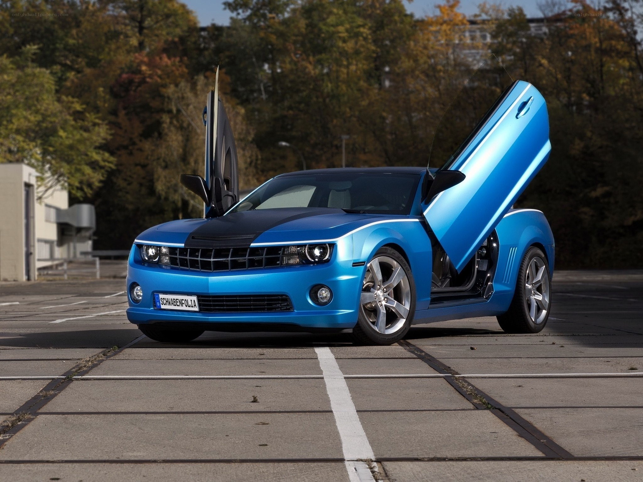 Blue Camaro with gullwing doors