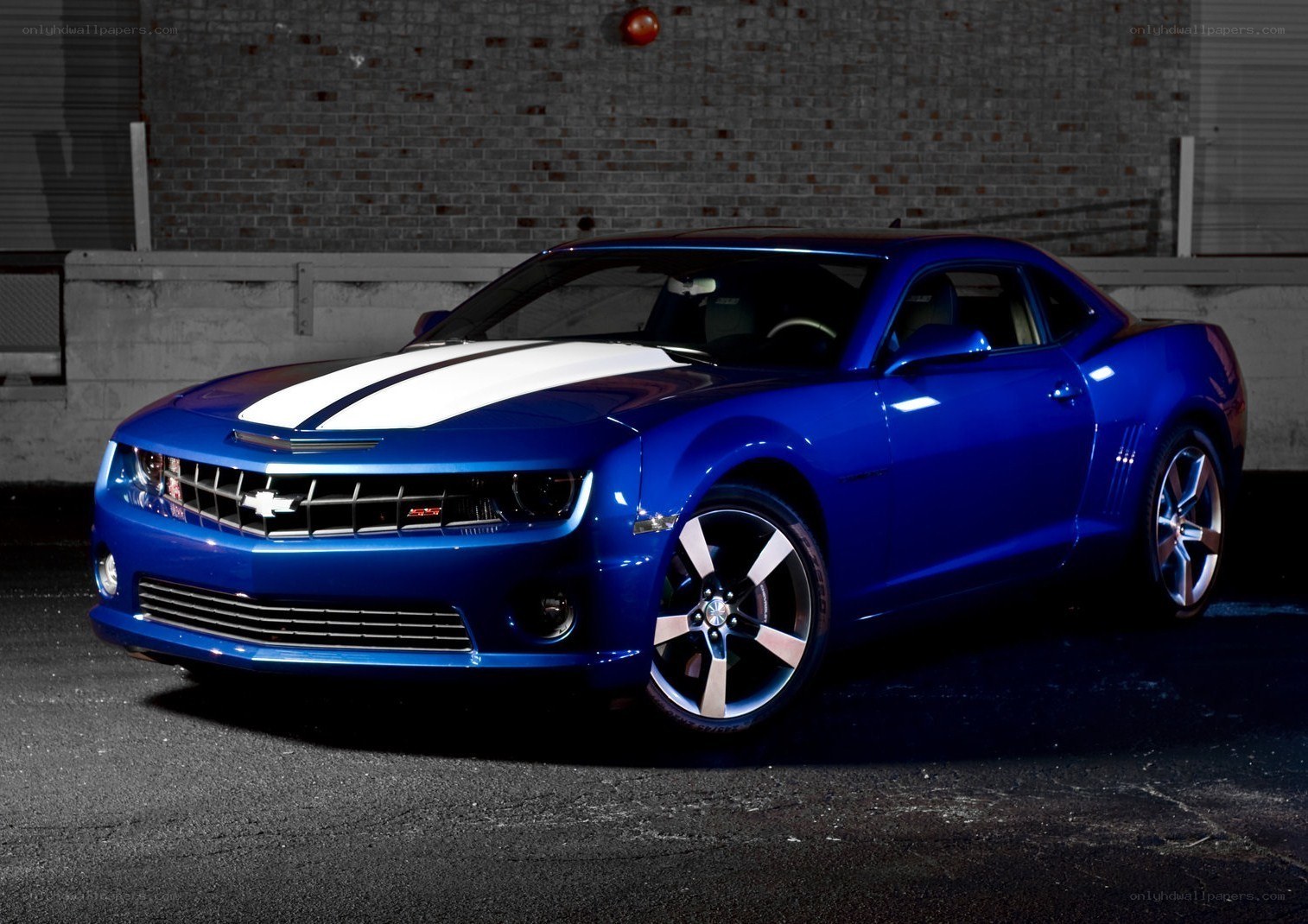 Blue Camaro with racing stripes
