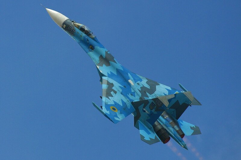 Blue Camouflaged Jet Fighter — Dynamic