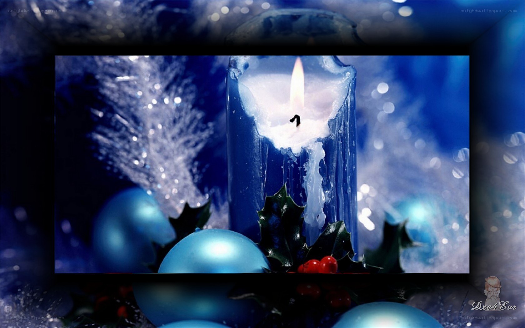 blue candle with holly berries