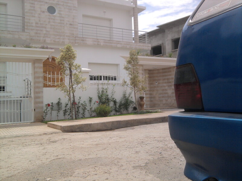 Blue Car and House