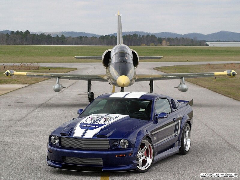 Blue Car and Jet Aircraft