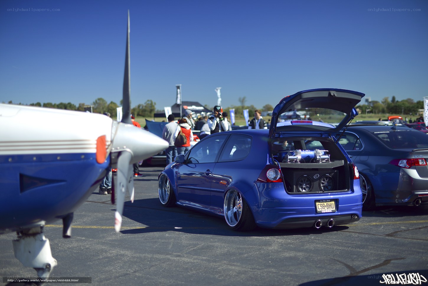 Blue car at airshow