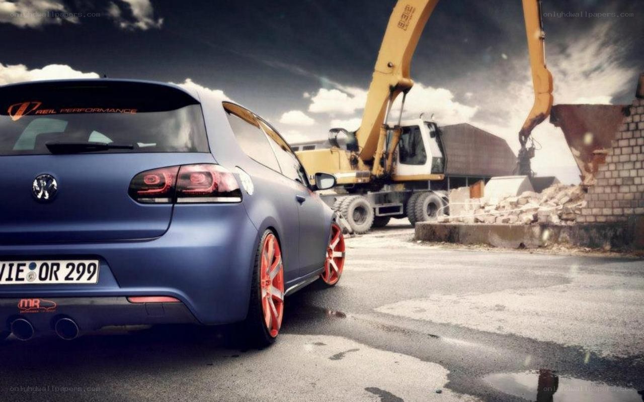 Blue car at construction site