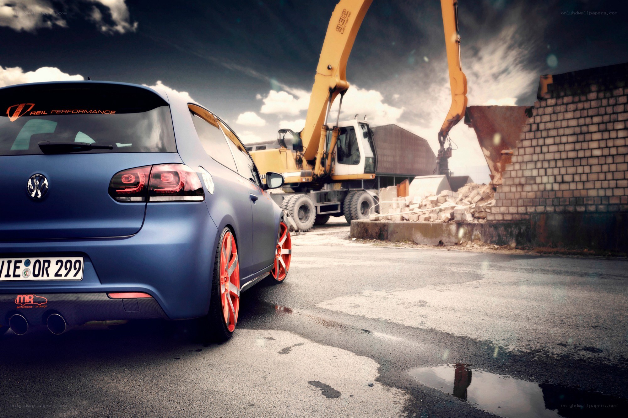 Blue car at demolition site