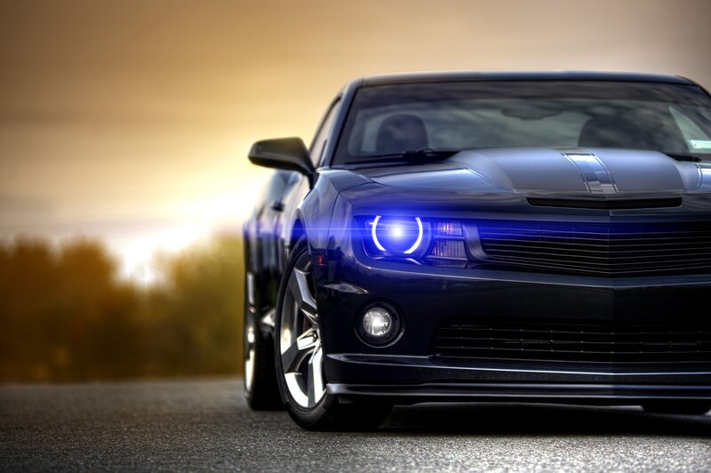 blue car at sunset