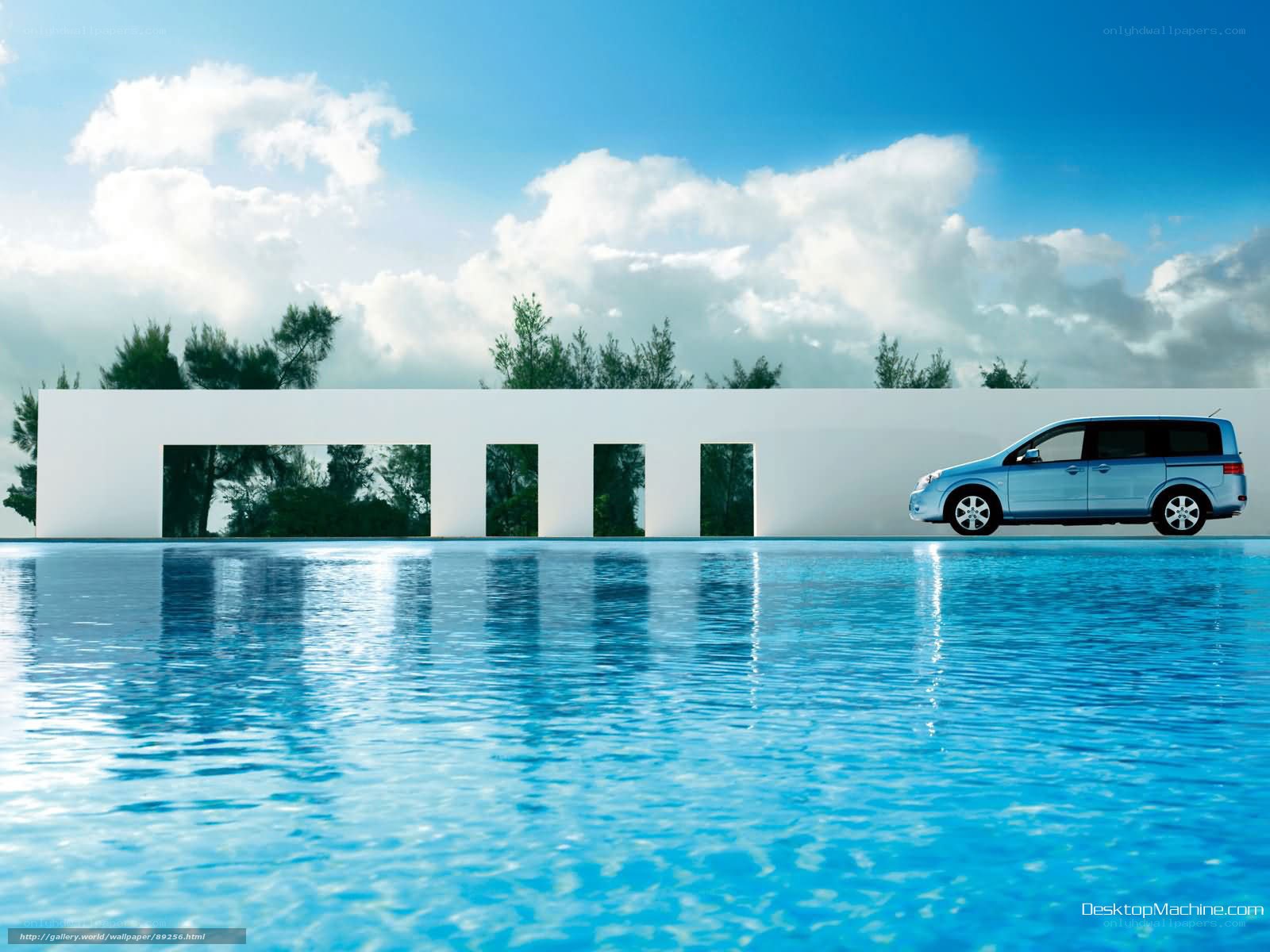 Blue car by poolside