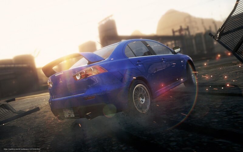 blue car drifting at sunset
