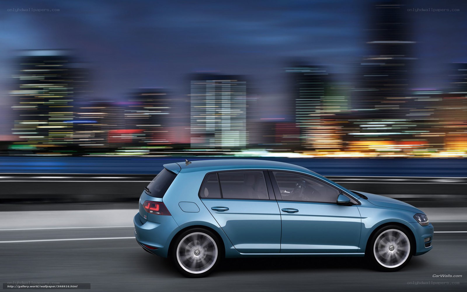 blue car driving at night