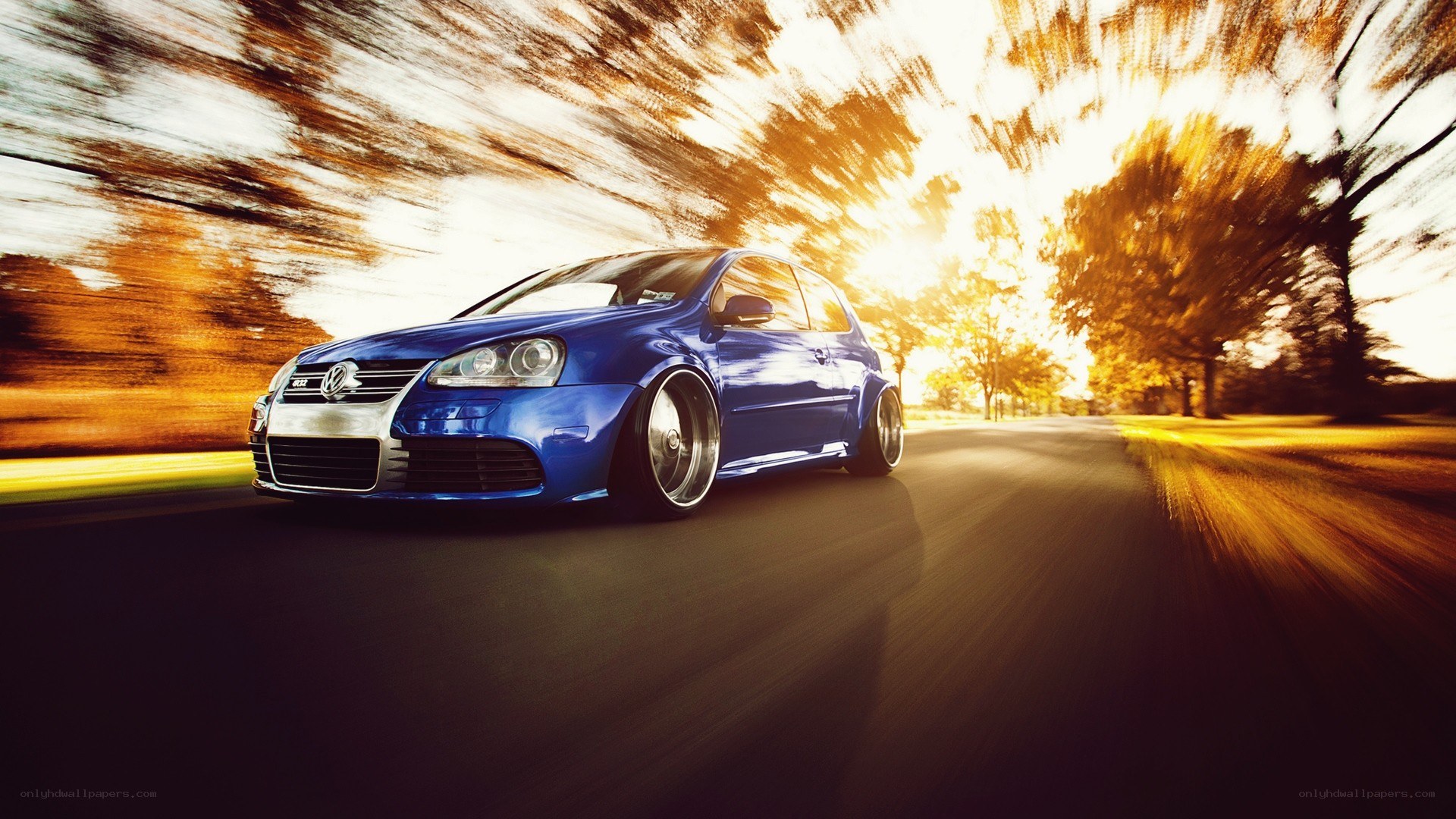 blue car driving fast