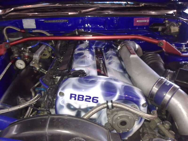 blue car engine bay