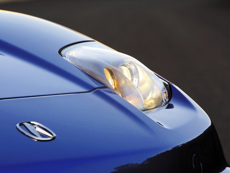 blue car headlight close-up