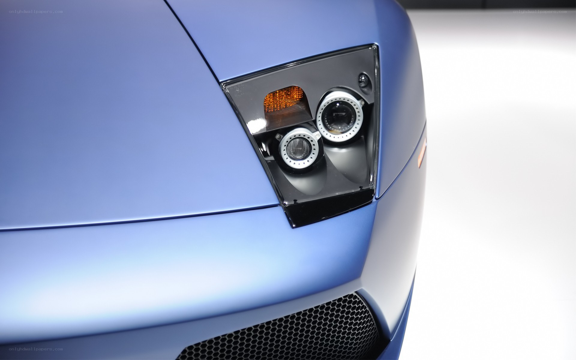 blue car headlight detail