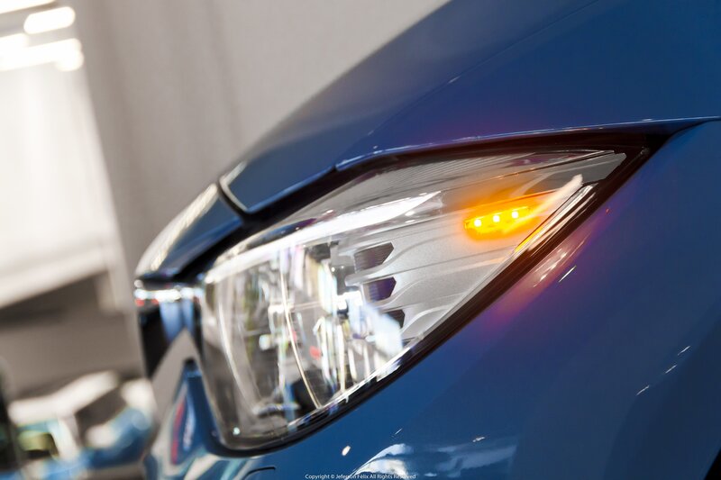 Blue Car Headlight — Dramatic, Photograph, Car Body