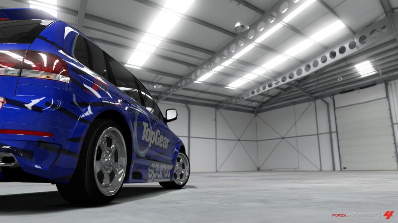 Blue car in a garage